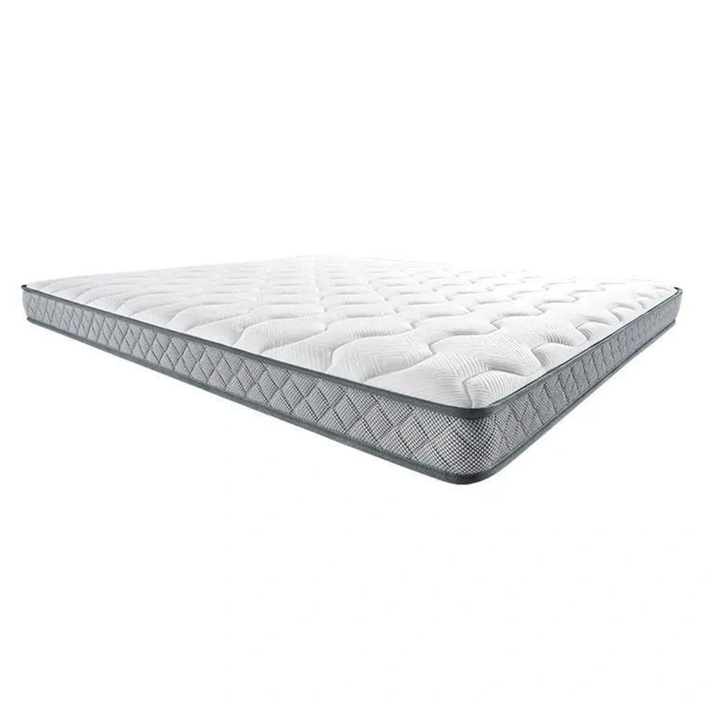 White mattress with quilted top and gray sides.