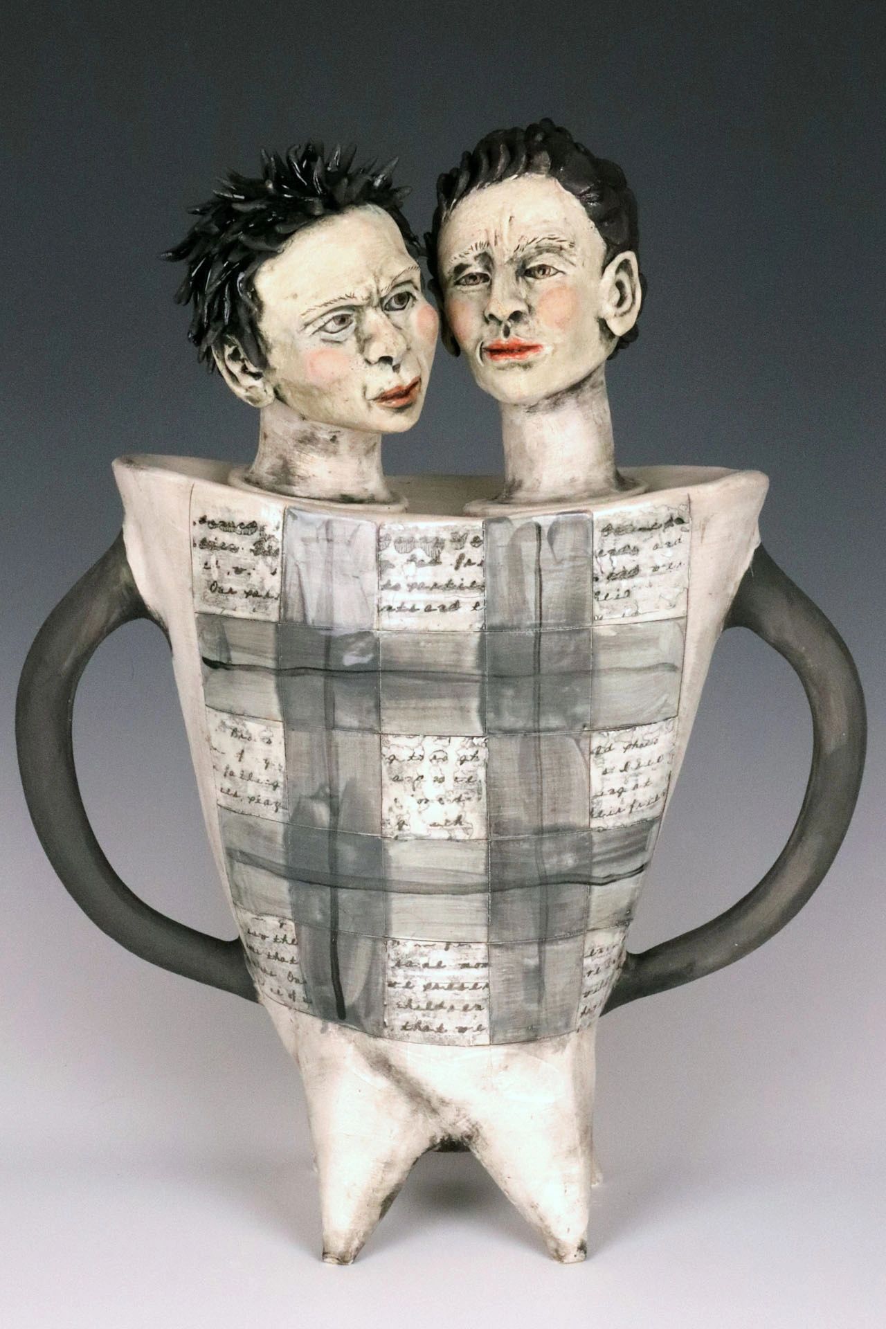 Vessel with two heads. An essay obscured.     15 x 12 x 5" inches 
$425