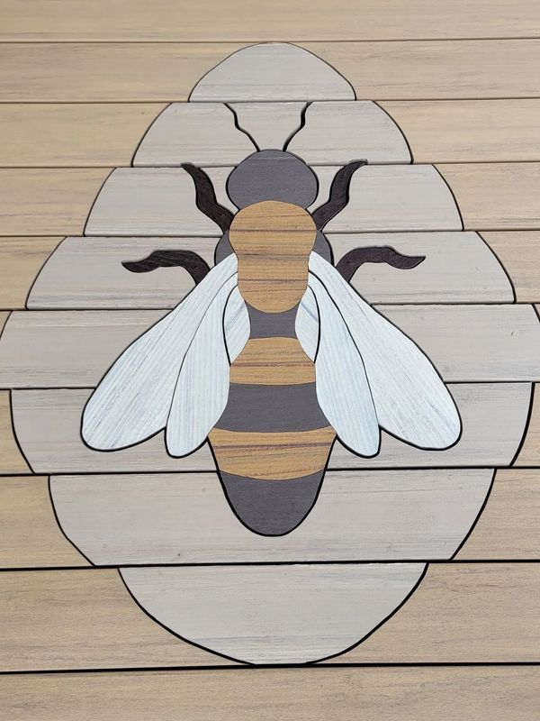 Finished design of the bee using customers'/clients photos and/or picture