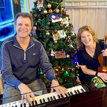 Tommy and I performing Christmas carols at Leal's Mexican Restaurant in Woodway