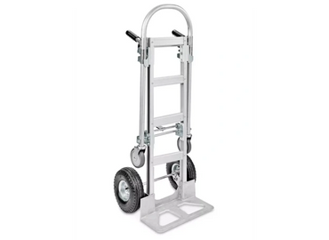 A silver hand truck with large rear wheels and smaller front wheels.