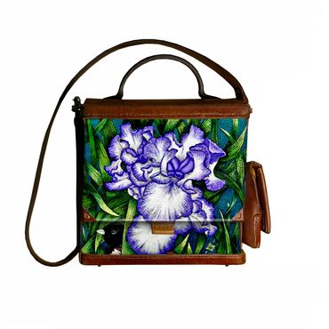 Junco peering out from under an iris drawn with quill and acrylic ink.