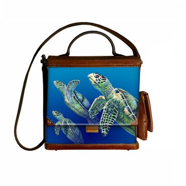 A trio of sea turtles. I drew these with acrylic ink and quill pen from videos I shot while free div