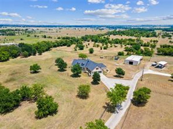 aerial view of a house and land in waxahchie