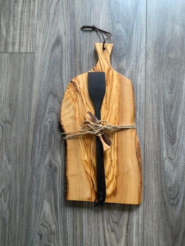 Imported Italian Olive Wood. Rustic. Beautiful grain. Live edge.