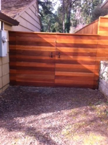 Stained horizontal clear grade double driveway gates 