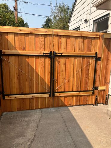 Back view of overlap picture frame style double driveway gates. 