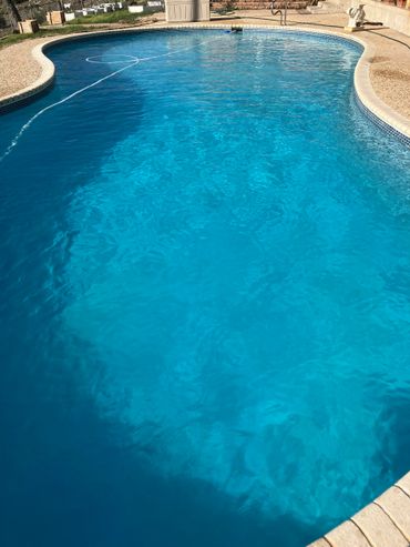 Crystal clear clean blue sparkling pool