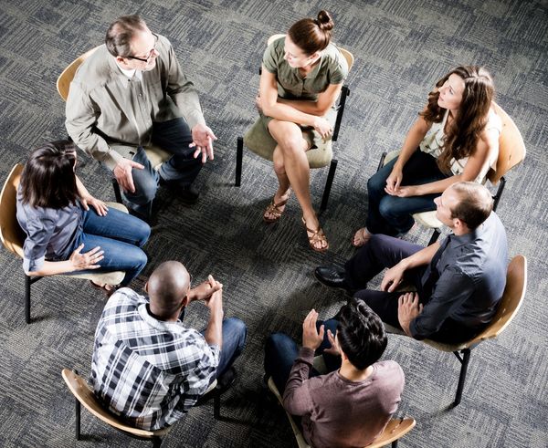 Support group discussion in circle