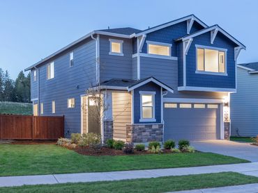 Exterior real estate twilight photo of a home.