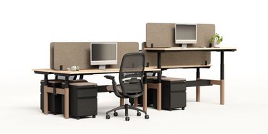 Modern dual workspace with ergonomic chairs and computers.