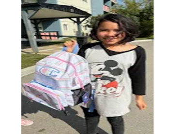 A new backpack for a new school. Compliments of Zoongizi Ode Inc.