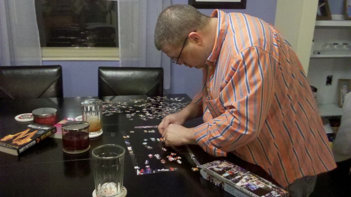 Craig enjoying putting together a puzzle in record speed