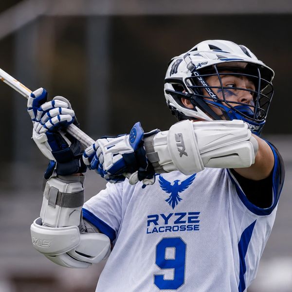 Lacrosse player in action during a game.