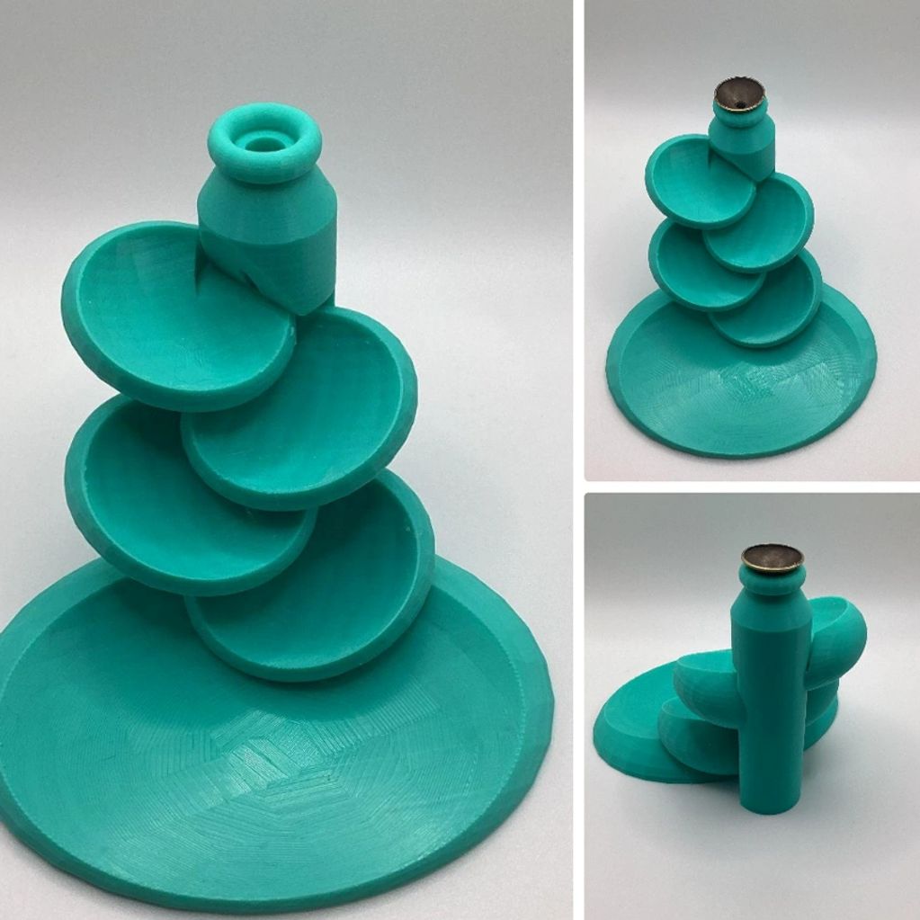 3D printed teal cascading fountain with multiple bowls.