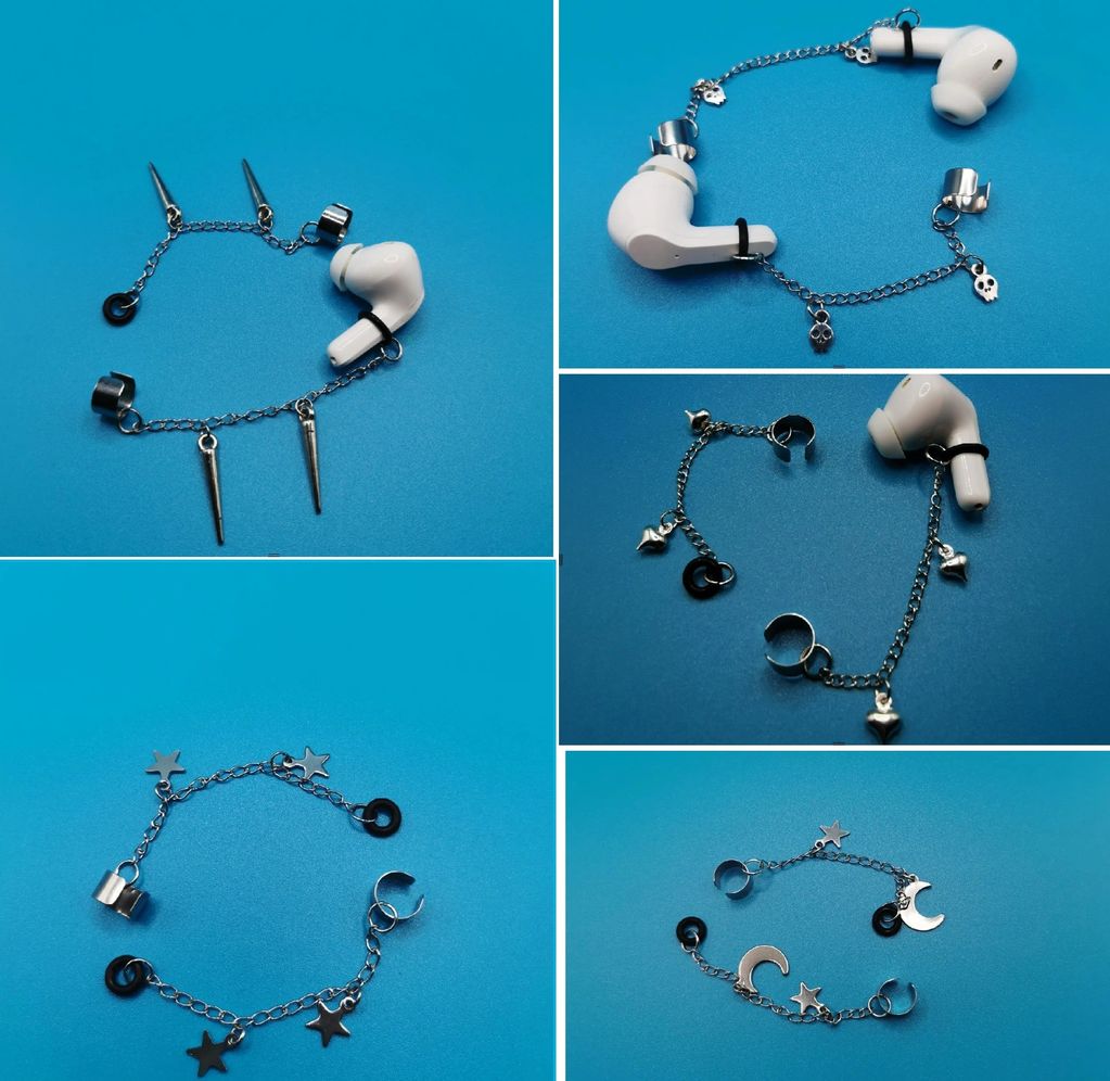 Creative ear cuff jewelry made with white earbuds and metal chains with charms.