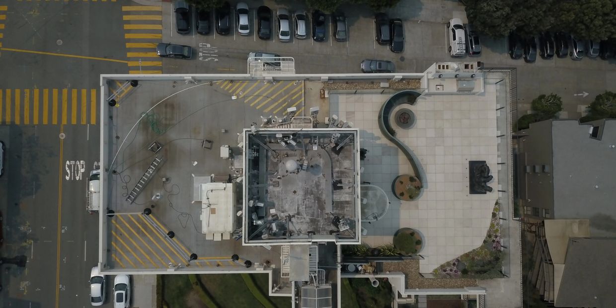 Close view of 5G cellular antennas secured on a building rooftop
