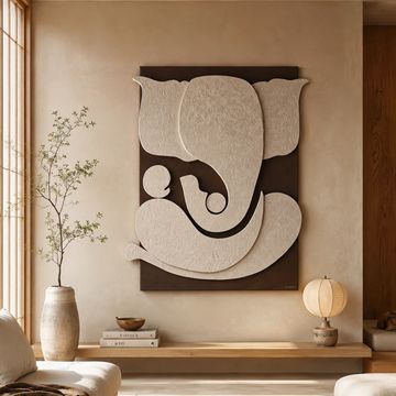 Minimalist living room with Ganesh wall art and neutral tones.