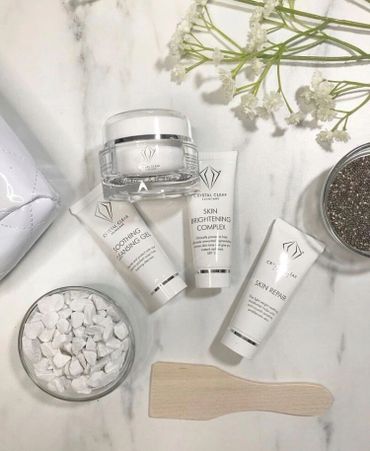 Crystal Clear beauty products against white background