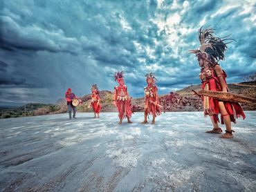 Minahasan Dancers equipped with their bold red traditional garments