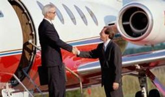 Two man handshake each other