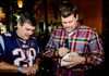 Celebrity Guest 3x Super Bowl Champ Mark Schlereth signing an autograph for guest