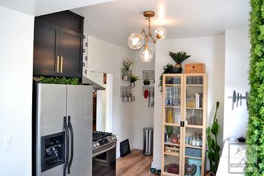 Kitchen Remodel modern lights and flooring installed by Smiff’s Remodeling in Lakewood, Ohio
