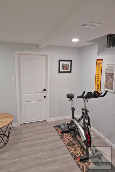 Basement remodel in Rocky river, Ohio - new walls, door and floor installed by Smiff’s Remodeling