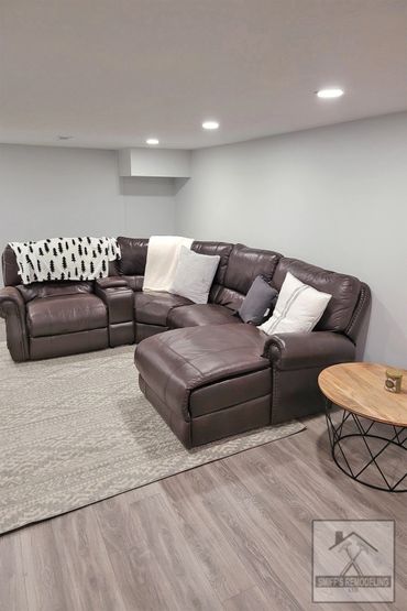Basement remodel in Rocky river, Ohio - new walls, lights and floor installed by Smiff’s Remodeling