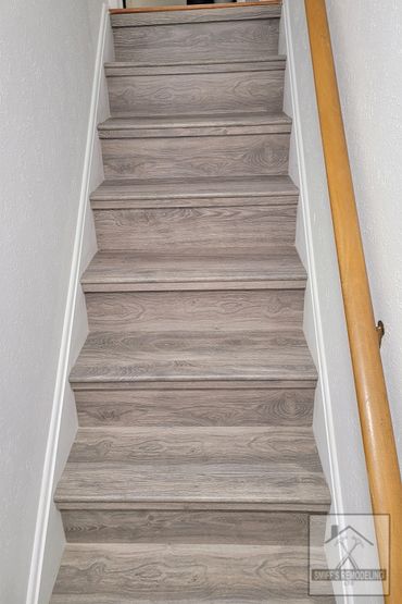 Basement remodel in Rocky river, Ohio - new luxury vinyl floors installed by Smiff’s Remodeling
