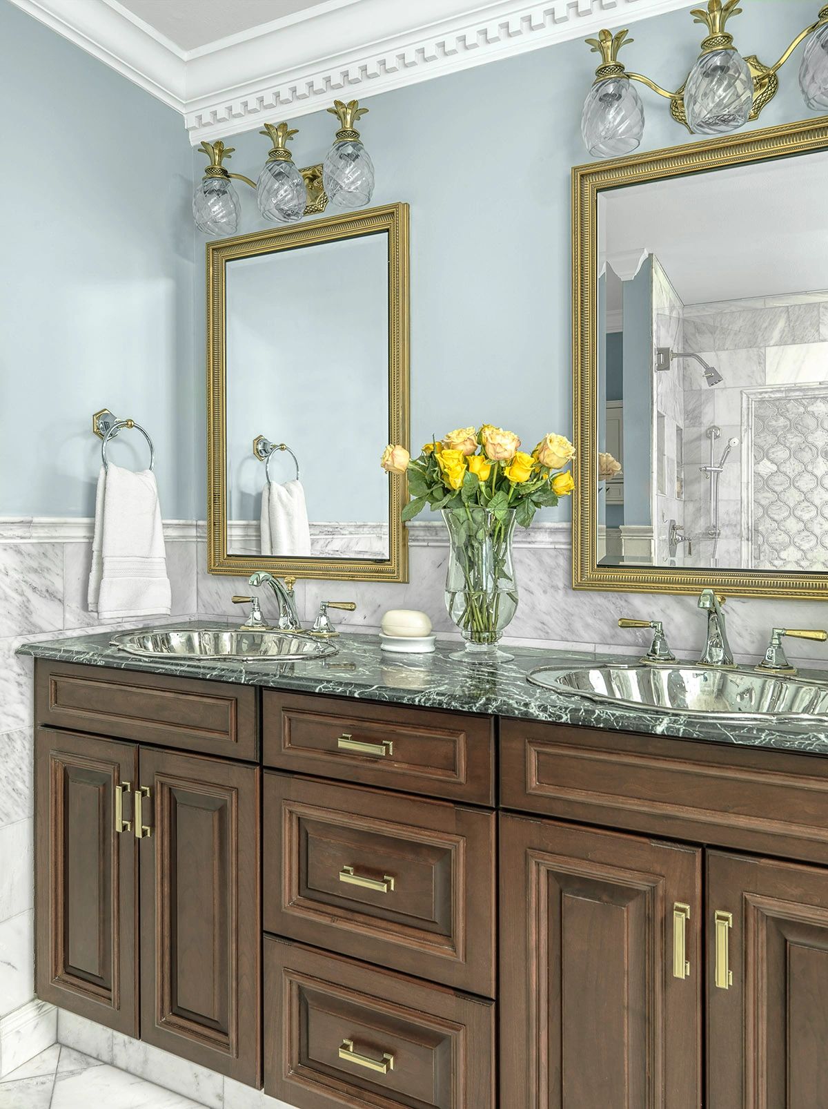 Sink, mirrors, and cabinets