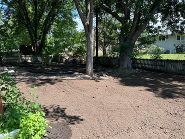 Black dirt hauled in and spread in this backyard in Lakeville.