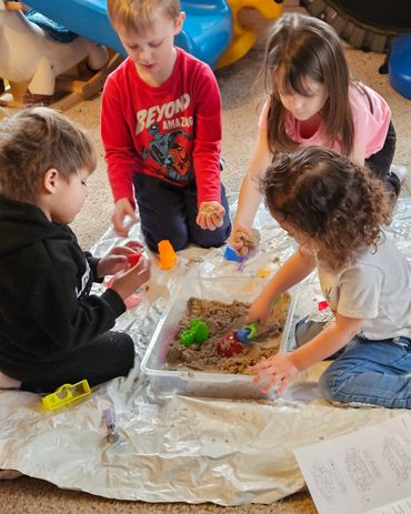 Getting dirty in sand! Play that enables fine motor skills!