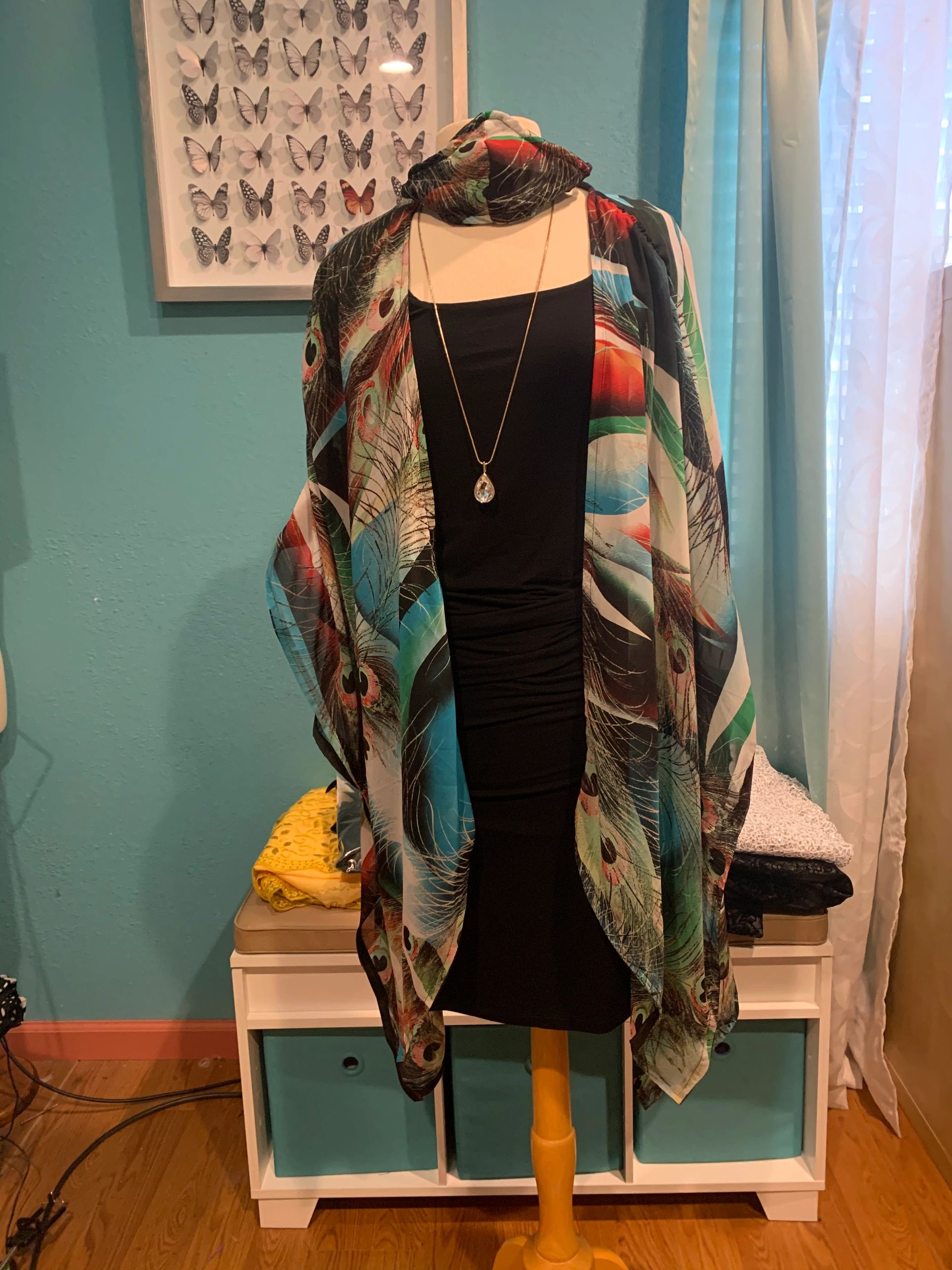 The Peacock wrap with matching mask Retails for $80. Fabric; lightweight poly-rayon. #sexy#trendy