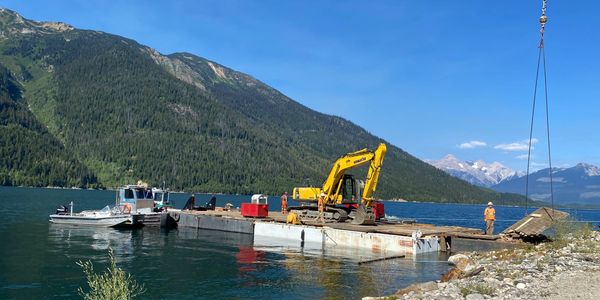 Sweeper boom decommissioning and installation. BC hydro Mica creek.