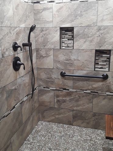 Pebble floor, bronze and marble accents