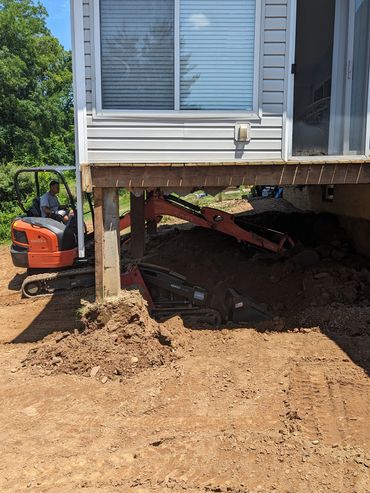 Excavate to make use of space under roof