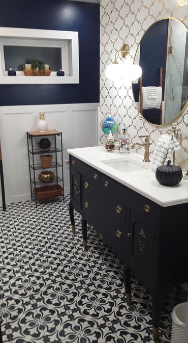 Gold accents abound a luxurious bathroom remodel