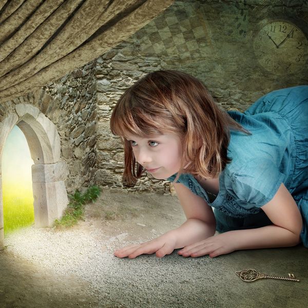 Girl looking the world through a small door.