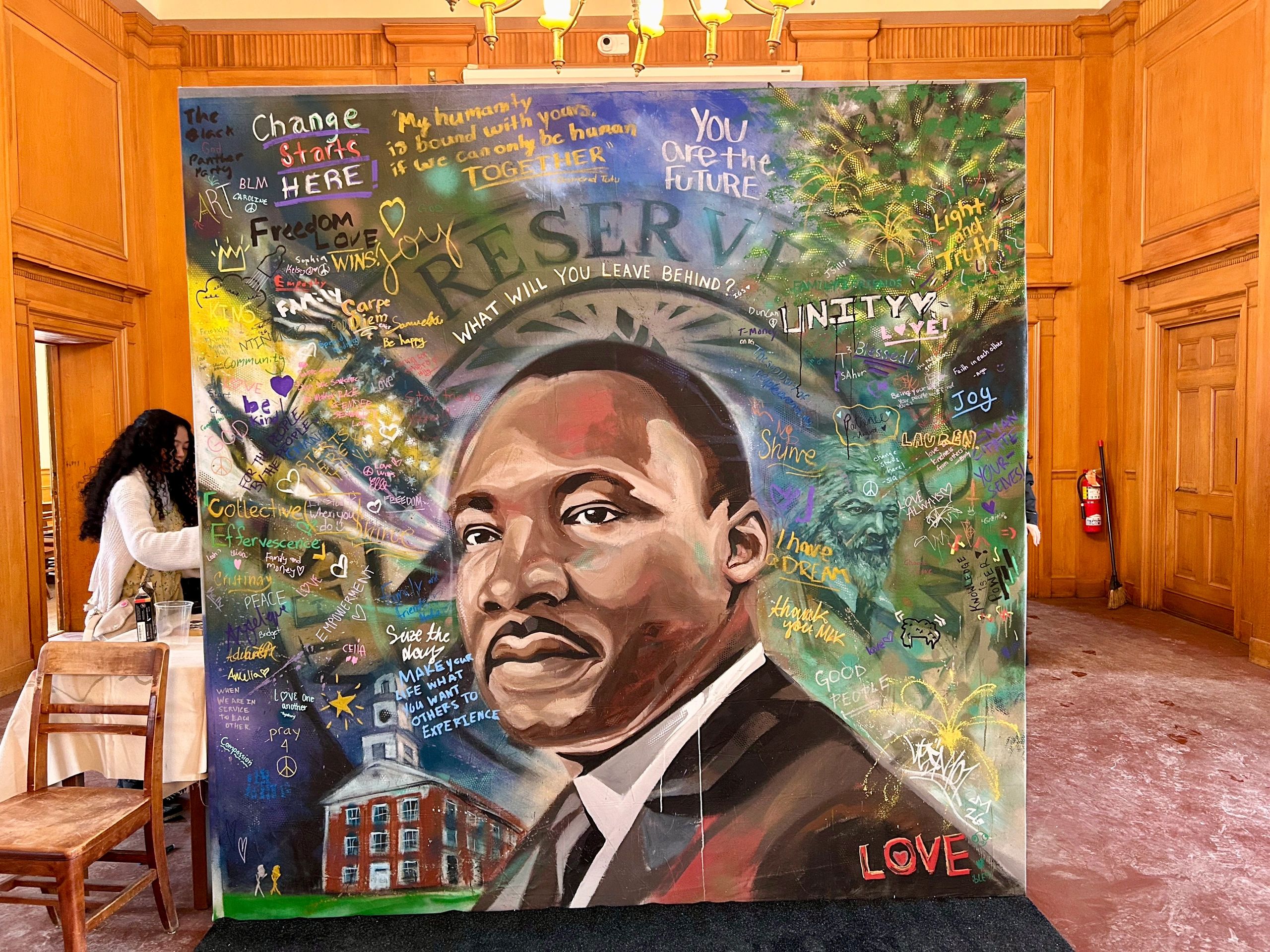 Mural portrait of Martin Luther King Jr. in graffiti and abstract style at Western Reserve Academy