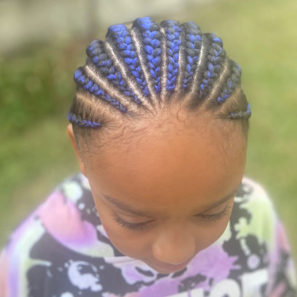 Simple cornrows with added hair.