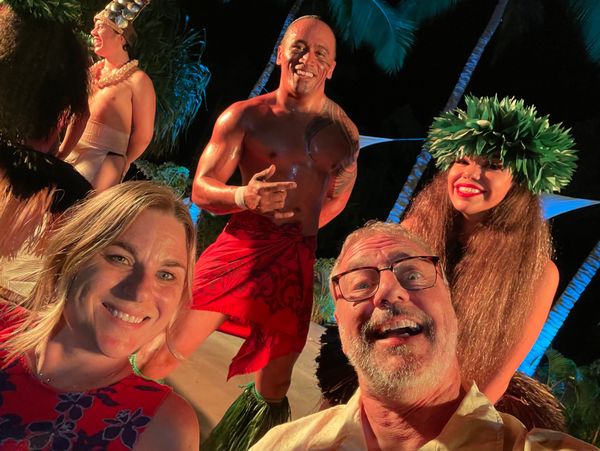 Larry and Kristi at the Outrigger Kona Lu'au during Angels of Hippocrates Happy Doc Hawaii 2023.