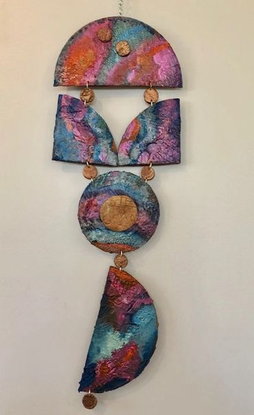 Two dimensional abstract artwork resembling Raku pottery. Wall hanging.