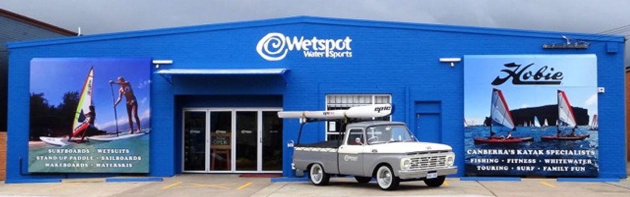An F100 ute in front of Wetspot Watersports, heaven for water sports equipment lovers in Canberra.