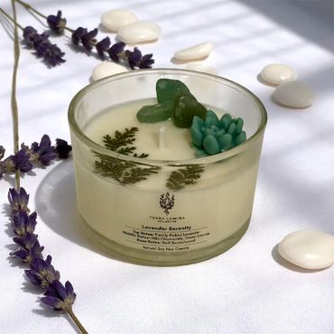 4 oz Lavender Serenity candle with green aventurine crystals, a wax succulent, and fern leaves.