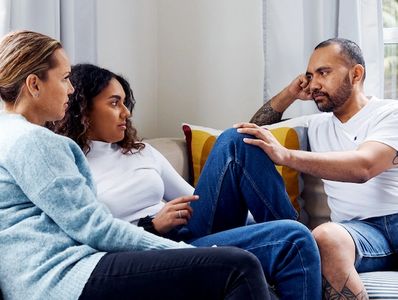 Parents having a critical conversation with their teenager.