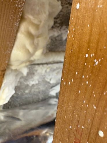 large chunks of foam left in place and hidden under foil blanket