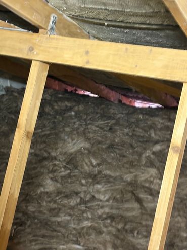 The eaves, the timbers and the bitumen felt clear from spray foam insulation. You can see the eaves