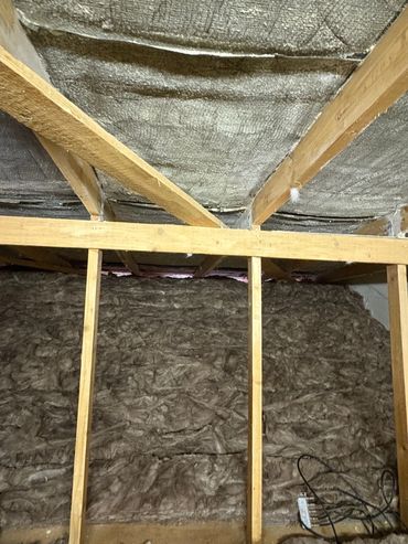 front face of roof showing the eaves cleared and ventilating loft space. SFIR Home Improvements