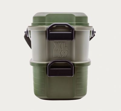 Stacked green and olive XL K9 storage containers with black handles.
